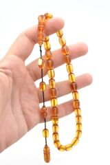 Hakkı Usta İmzalı Kapsül Kesim Şeffaf Sıkma Kehribar Tesbih