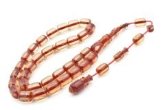 Hakkı Usta İmzalı Kapsül Kesim Şeffaf Kırmızı Sıkma Kehribar Tesbih