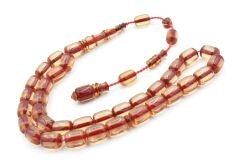 Hakkı Usta İmzalı Kapsül Kesim Şeffaf Kırmızı Sıkma Kehribar Tesbih