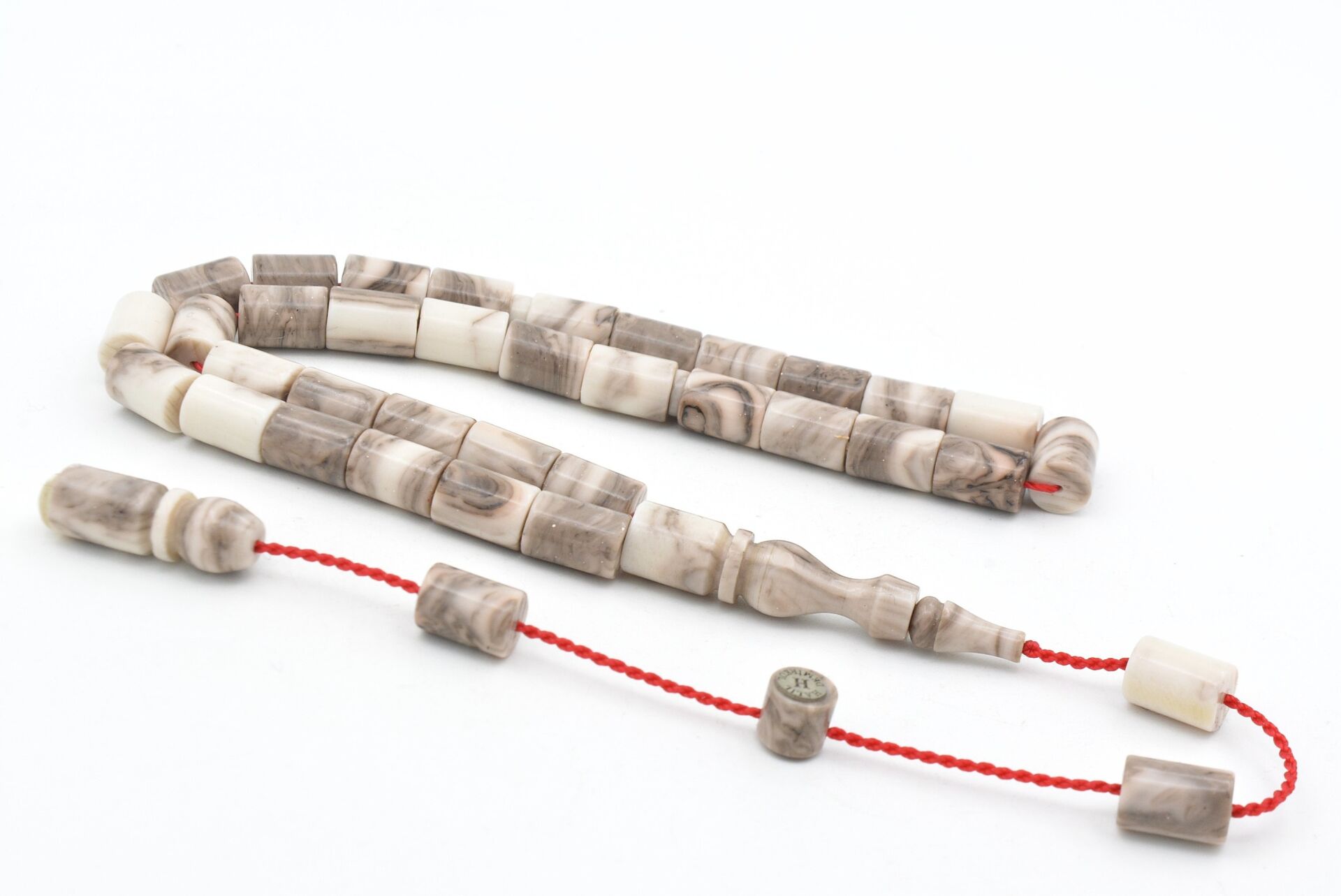 Halil Usta İmzalı Kesme Model Bilek Boy Gri Beyaz Sıkma Kehribar Tesbih