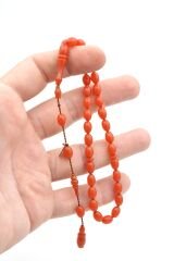 Hakkı Usta İmzalı Beyzi Kesim Bilek Boy Pembe Sıkma Kehribar Tesbih