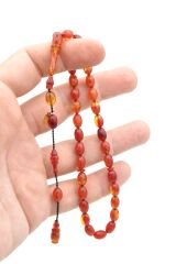 Hakkı Usta İmzalı Beyzi Kesim Bilek Boy Hareli Pembe Sıkma Kehribar Tesbih