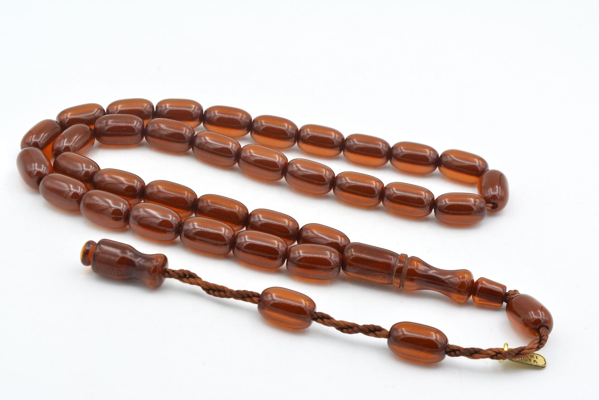 Hakkı Usta İmzalı Kapsül Model Günlük Boy Kahverengi Sıkma Kehribar Tesbih