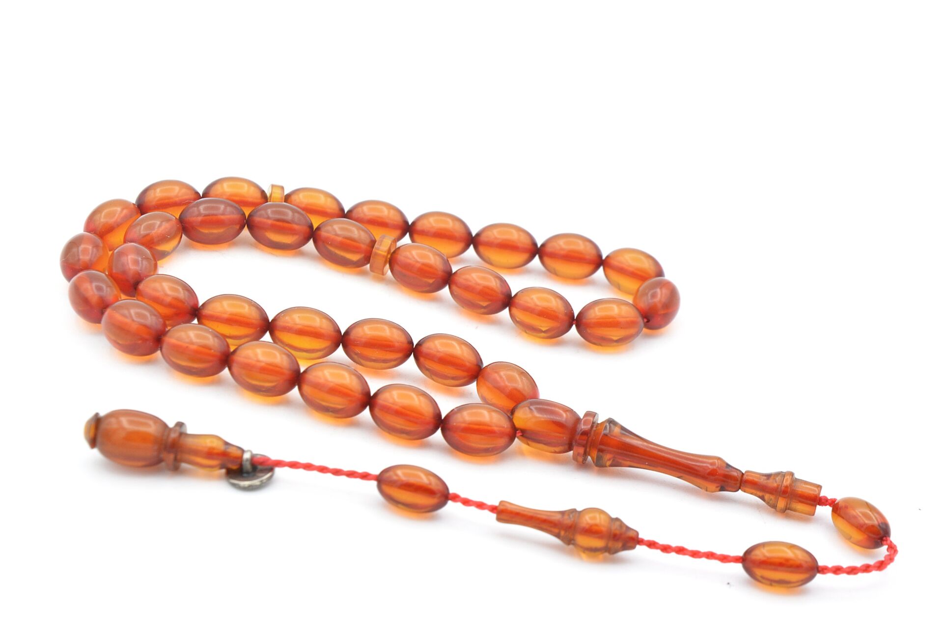 Sistemli Beyzi Kesim Bilek Boy Turuncu Kehribar Sıkma Tesbih