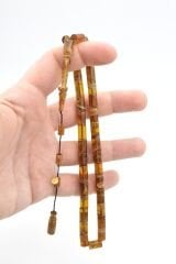 Hakan Turan İmzalı Kesme Model Hareli Kahverengi Sıkma Kehribar Tesbih