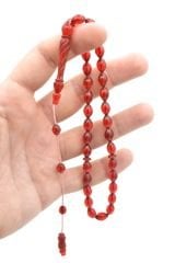 MUSTAFA UYSAL USTA YAPIMI SİSTEMLİ OYMA İMAMELİ KIRMIZI SIKMA KEHRİBAR TESBİH