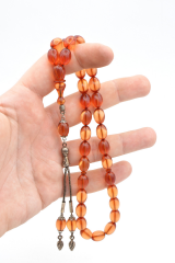 0.6 Şeffaf Delim Beyzi Kesim Açık Pembe Ateş Kehribar Tesbih